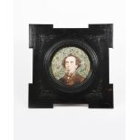 A large Douglas Ceramic Portrait roundel tile, painted with a portrait of Charles Dickens, in