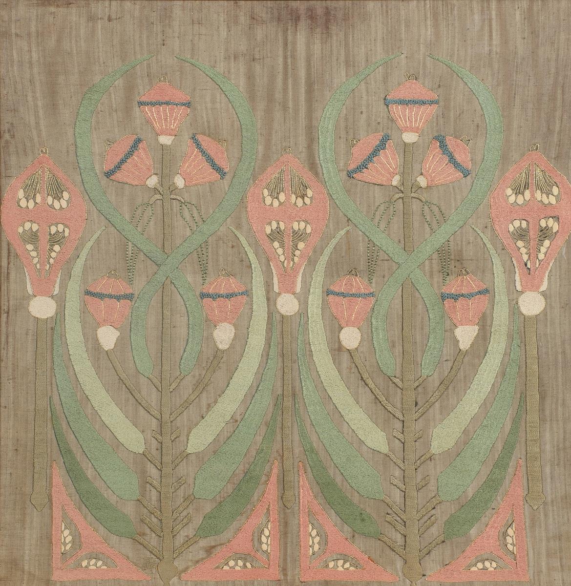 An Art Nouveau silk embroidered panel, decorated with stylised flower stems in pink and green silks,