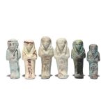 Six Egyptian shabtis Third Intermediate Period, circa 1070 - 735 BC four with hieroglyphs and five