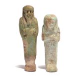 An Egyptian faience shabti Late Period, circa 664 - 332 BC with arms crossed and holding a pick