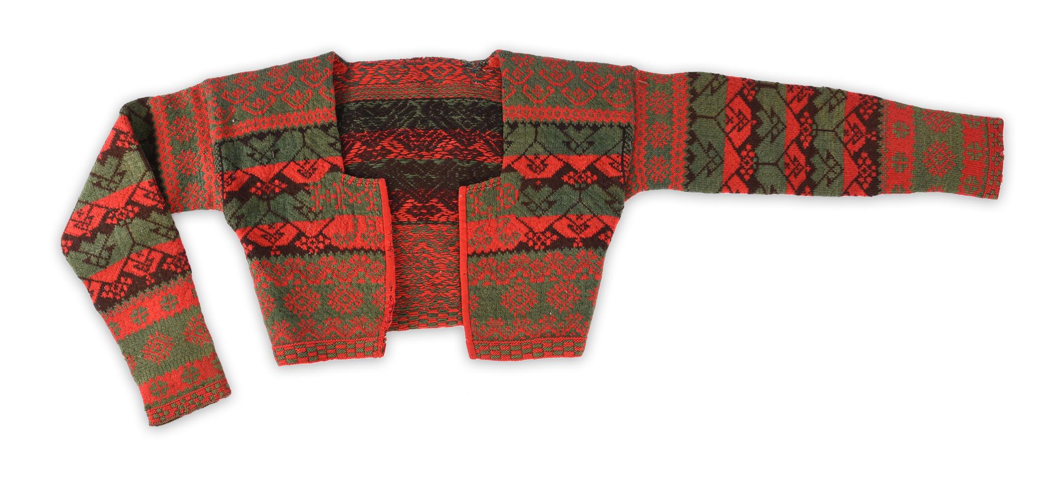 A Swedish childs cardigan dated 1867 red, green and black wool, with initials HM LD and 18 67, 38.