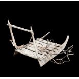 A Inuit model sleigh Greenland bone and sinew, 28.5cm long.