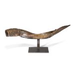 A Congo trumpet Democratic Republic of the Congo antelope horn with brass studs and banding, with