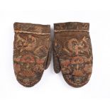 A pair of Swedish childs mittens late 19th century leather with silk embroidery depicting birds,