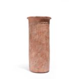 An Egyptian red pottery cylindrical jar Predynastic Period, circa 3200 - 3000 BC with a wavy band