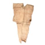 A Jivaro poncho South America bark cloth with the remains of painted linear decoration, with a