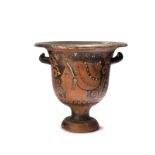 A Greek Apulian red figure bell krater circa 4th century BC each side with the profile head of a