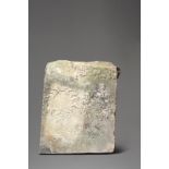 A Roman marble stele circa 2nd century AD carved in low relief two olive wreaths and Greek lettering