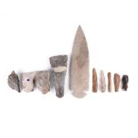 A collection of flint tools including a large Mexican blade, 23.5cm, three Egyptian knives, an