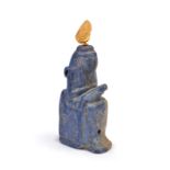 An Egyptian lapis lazuli amulet of seated Isis Late Period - Ptolemaic Period, circa 664 - 30 BC