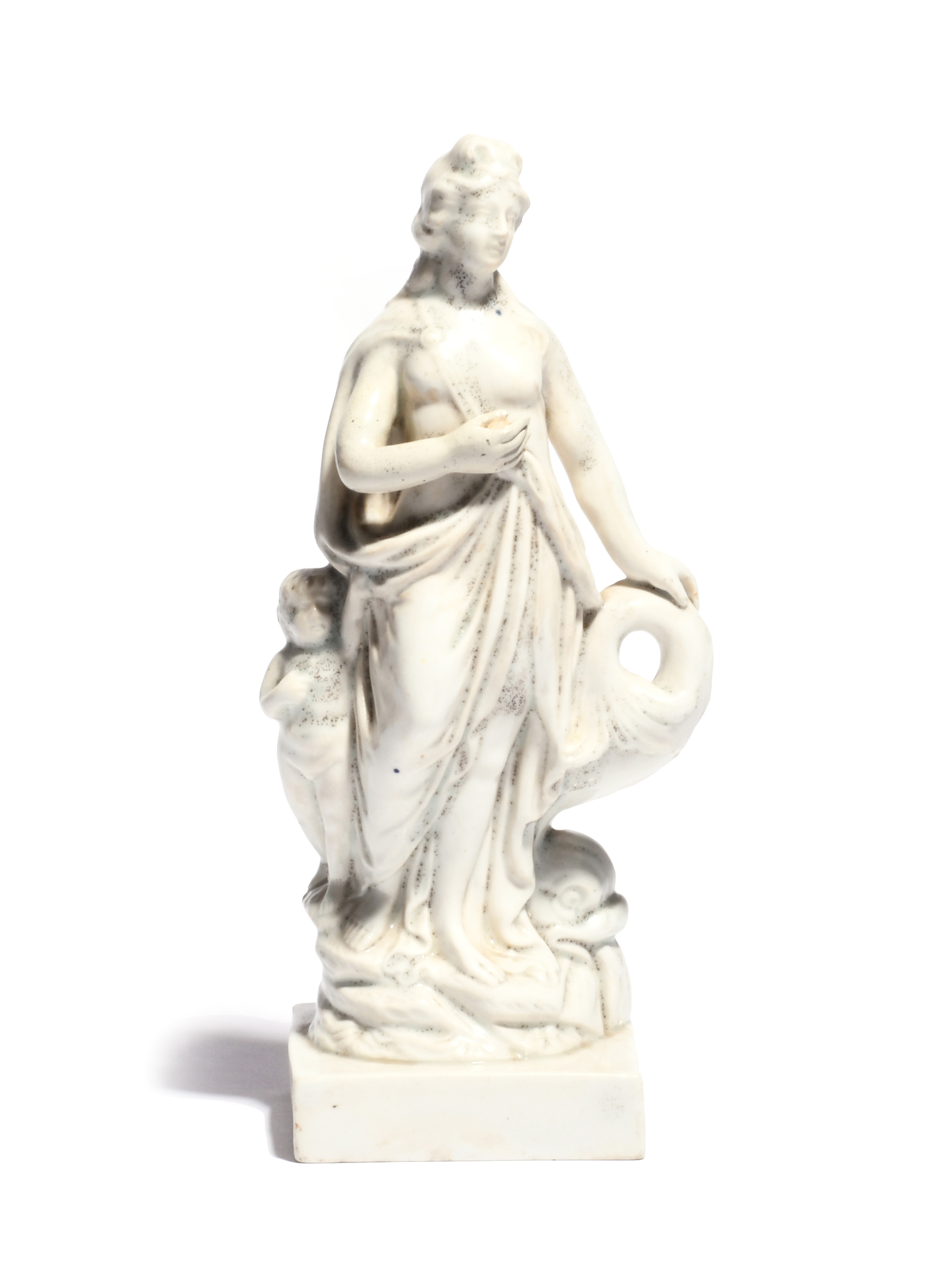 A Staffordshire porcelain figure of Venus late 18th century, standing and resting one hand on the