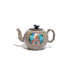 A salt-glazed stoneware teapot with associated cover c.1755, the globular body brightly painted with