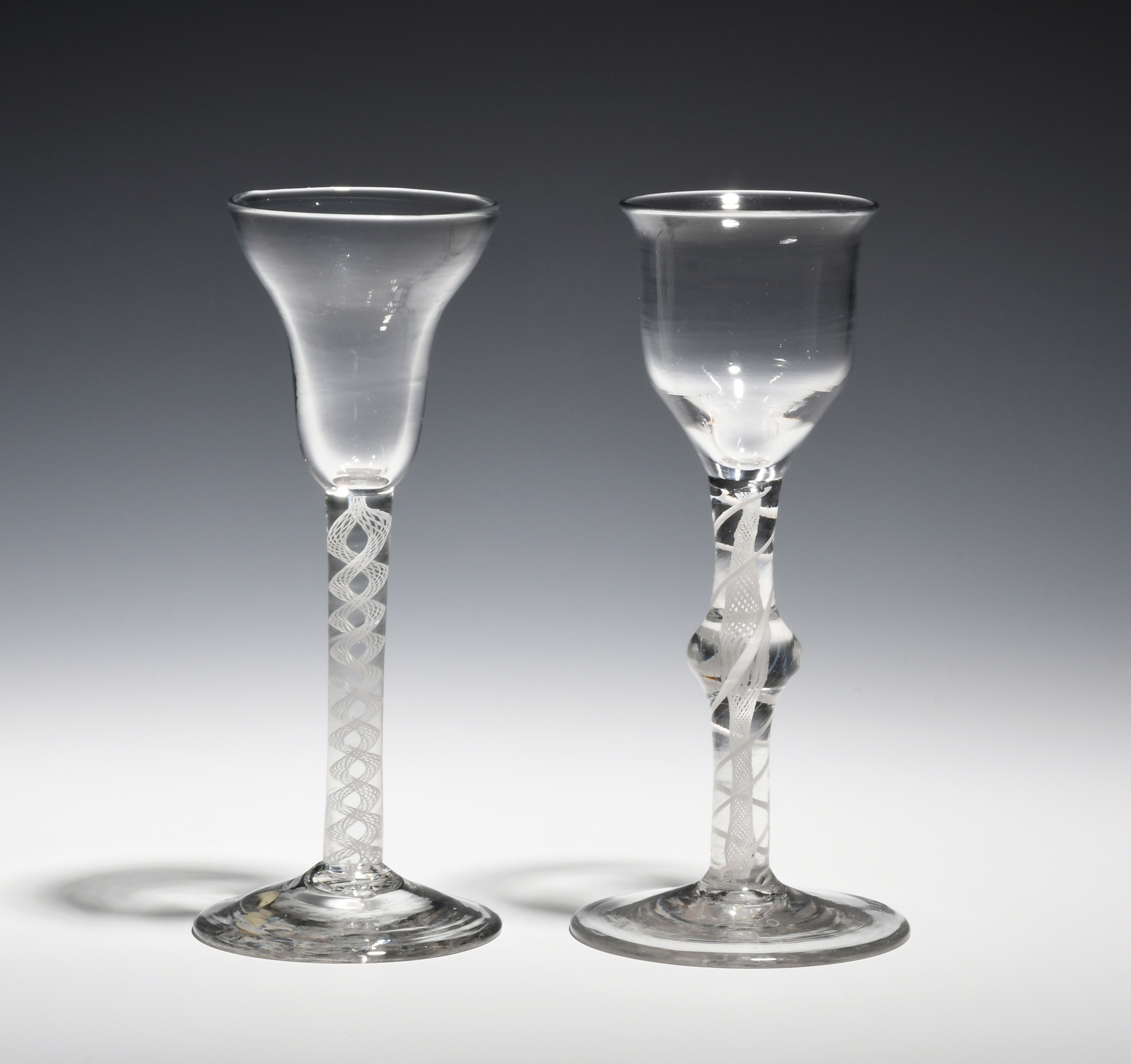 Two wine glasses c.1760-70, one with a pan-top bowl on an opaque twist stem, the other with an - Image 2 of 2