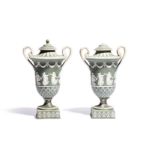 A pair of Wedgwood tricolour Jasperware vases and covers early 19th century, applied with the