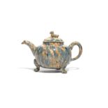 A Staffordshire agateware teapot and cover c.1755, the squat globular body with blue and manganese