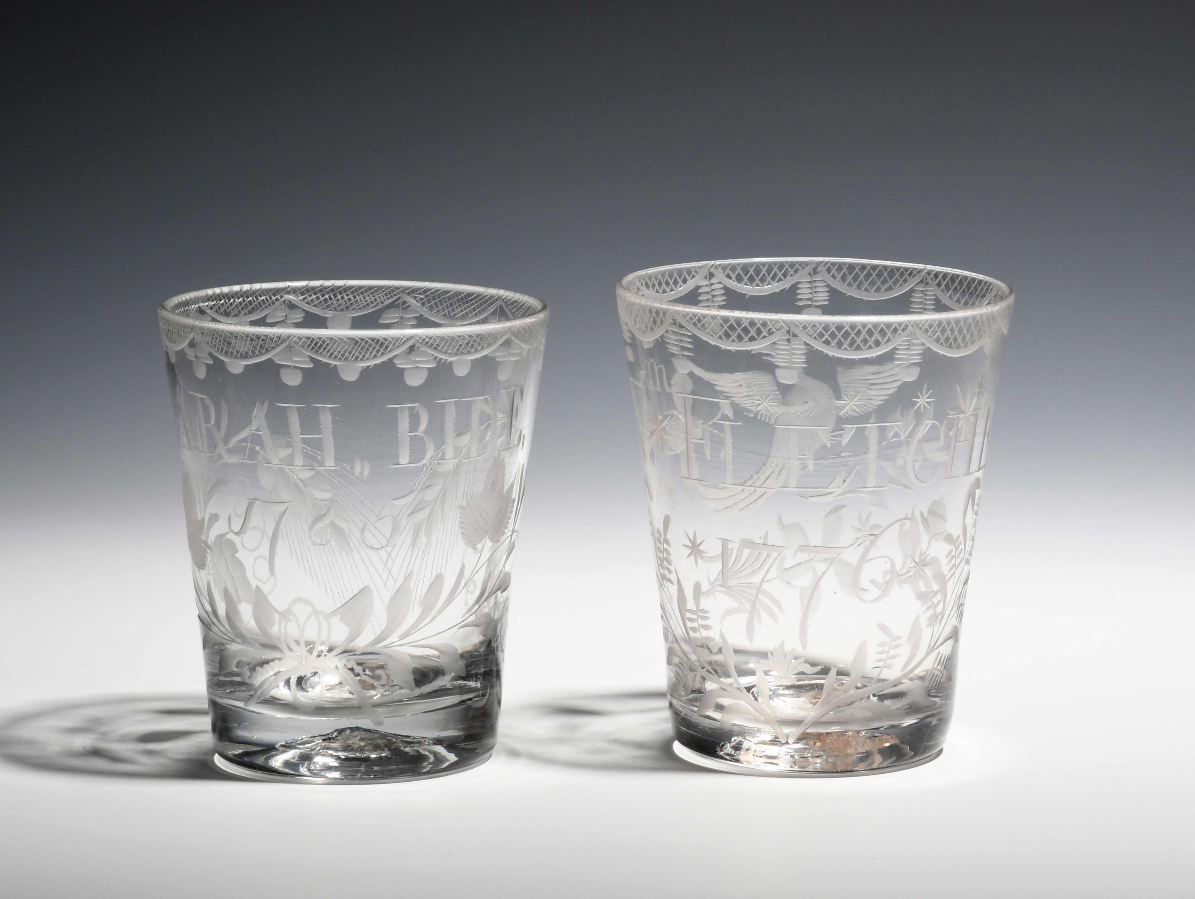 Two glass rummers or tumblers dated 1776 and 1785, one engraved with birds and flowers around the