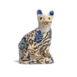 A rare Staffordshire salt-glazed agateware model of a cat mid 18th century, seated on its haunches