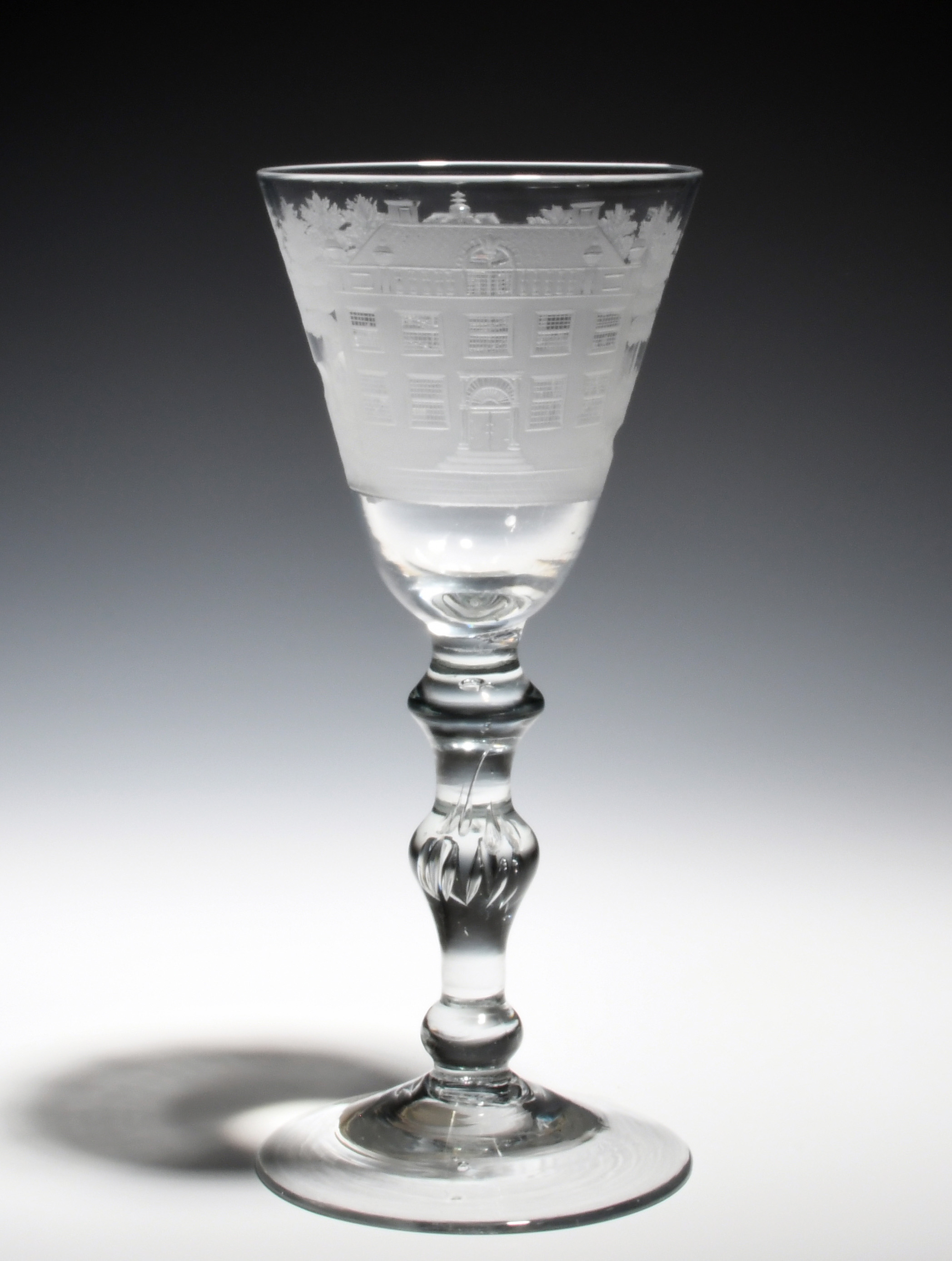 A Dutch-engraved light baluster glass c.1750, engraved in the manner of Jacob Sang with a continuous - Image 2 of 2
