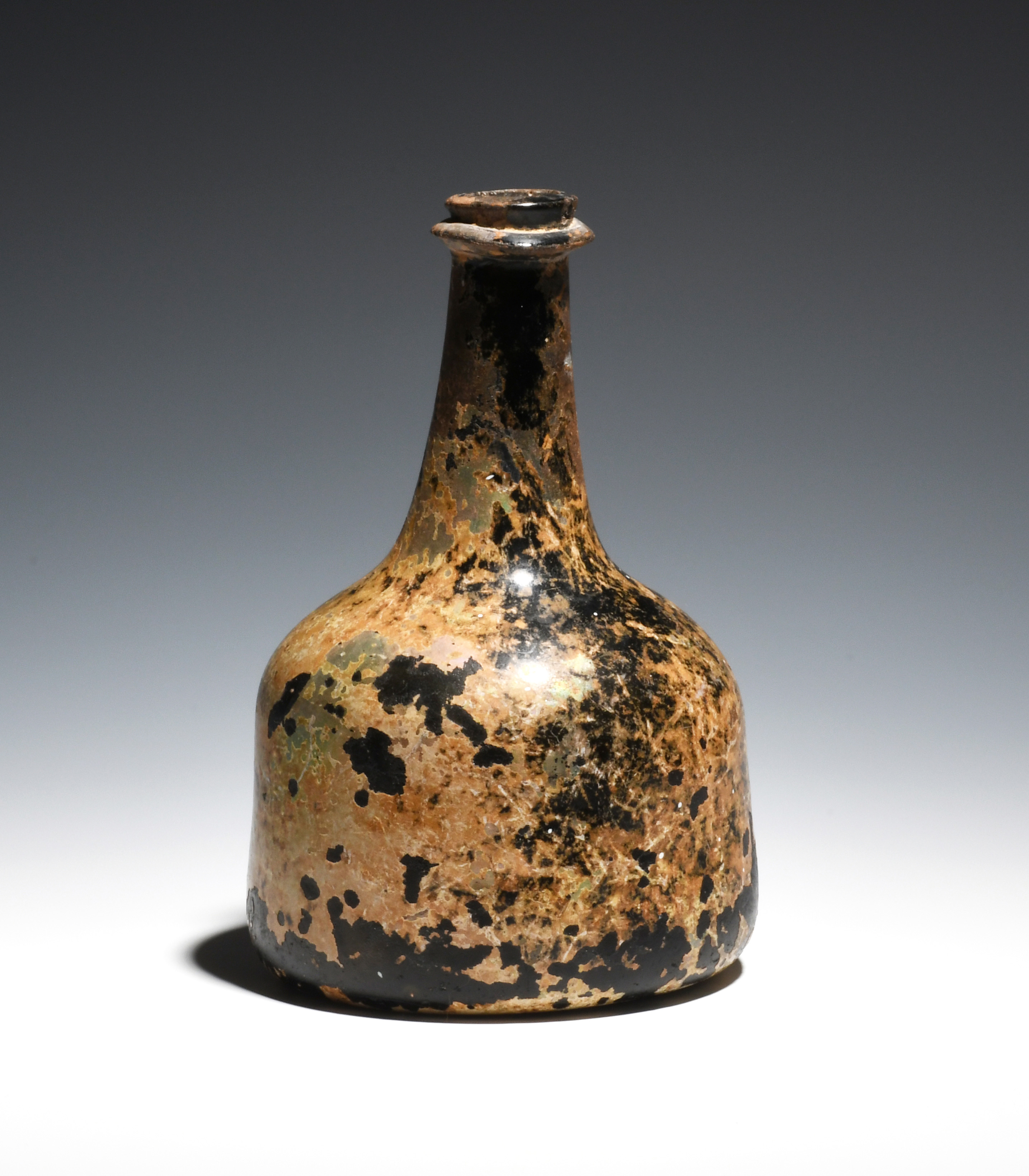 A small English glass wine bottle c.1720, of squat mallet form, with tapering neck, string rim and - Image 2 of 2