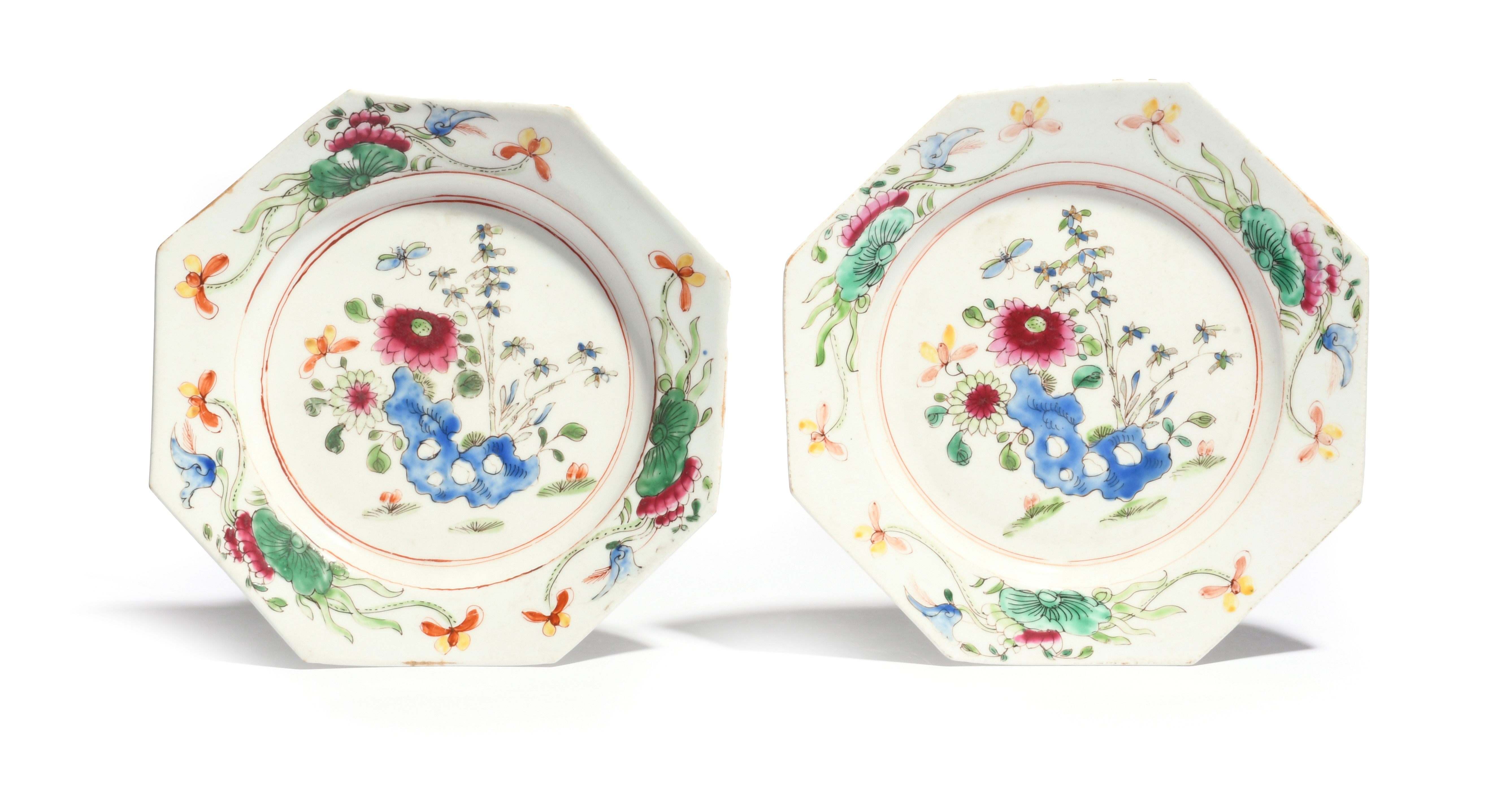 A pair of early Bow octagonal plates c.1752-55, painted in famille rose enamels with bamboo and