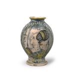 A Montelupo maiolica jar or albarello dated 1551, painted in green and blue with the profile