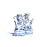 A Delft oil and vinegar cruet set probably 19th century, the octagonal forms brightly painted in