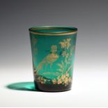 A green glass tumbler or beaker c.1765, gilded in the atelier of James Giles with an exotic bird