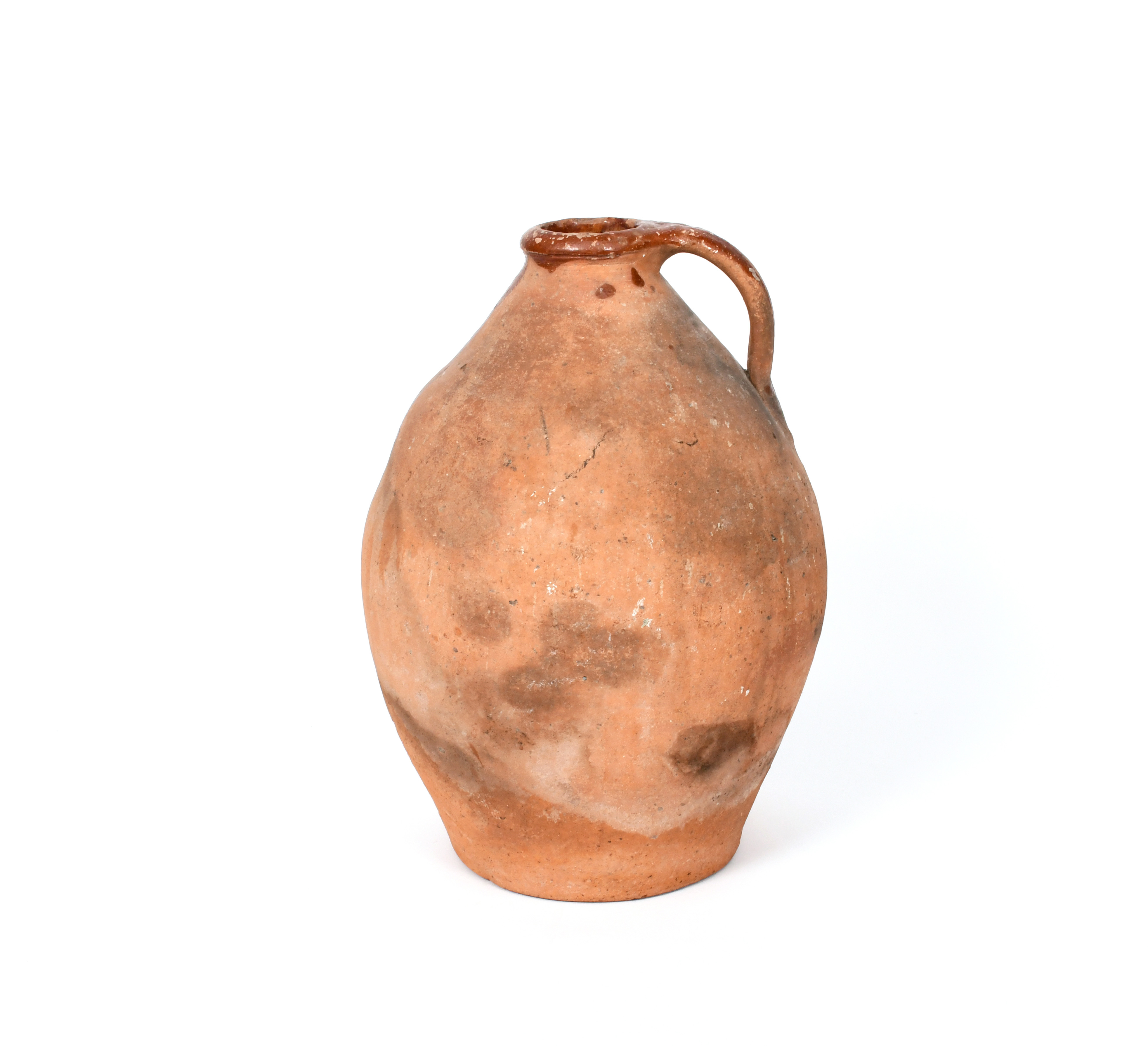A large post-medieval earthenware jug c.16th or 17th century, the swelling ovoid form applied with a