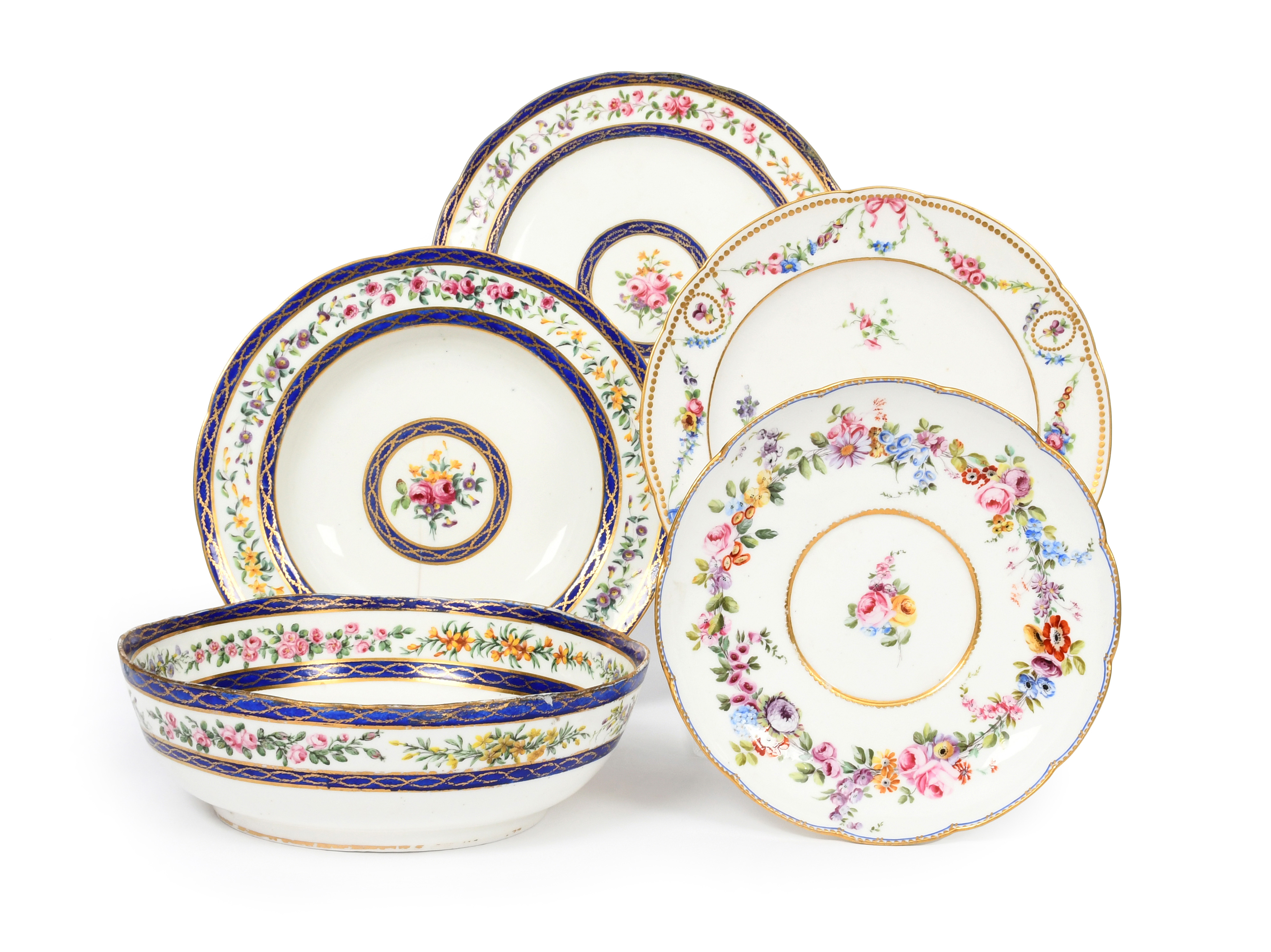 Four Sèvres plates (assiettes) and a bowl (compotier) c.1760-92, the bowl, one plate and a soup