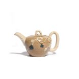 A small salt-glazed stoneware teapot and cover c.1770, applied with trailing grapevine in the