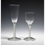 A wine glass and an ale glass c.1760, the wine with an ogee bowl moulded with flutes above an