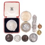 A small collection of historical medals and similar items, including: Archbishop Sancroft and the