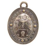 The Worshipful Company of Bakers: a silver-gilt livery badge, 44mm oval, Company arms and motto,