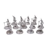 A set of twelve scratch built pewter models of Napoleonic era cavalry undertaking skill-at-arms