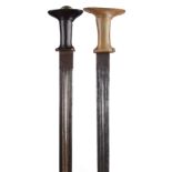 λ Ethiopia: Menelik II: two swords, the first with broad double edged blade 29.5 in., twin fullers