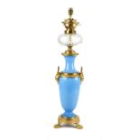 A FRENCH BLUE OPALINE GLASS AND ORMOLU OIL LAMP LATE 19TH CENTURY with its cut-glass reservoir,