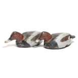 A PAIR OF FOLK ART CARVED AND PAINTED PINE DECOY DUCKS LATE 19TH / EARLY 20TH CENTURY 36cm long (
