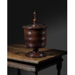 A FINE CHARLES II LIGNUM VITAE WASSAIL BOWL AND COVER C.1660-70 the lid with a turned cup and