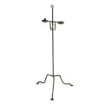 A GEORGE III WROUGHT IRON ADJUSTABLE FLOOR STANDING CANDLEHOLDER LATE 18TH CENTURY with twin arms,