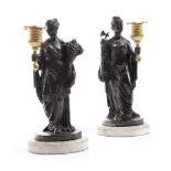 A PAIR OF REGENCY EBONISED PLASTER FIGURAL CANDLESTICKS IN THE MANNER OF HUMPHREY HOPPER, EARLY 19TH