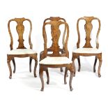 A SET OF FOUR WALNUT AND MARQUETRY SIDE CHAIRS EARLY 18TH CENTURY (4) each inlaid with cherubs,