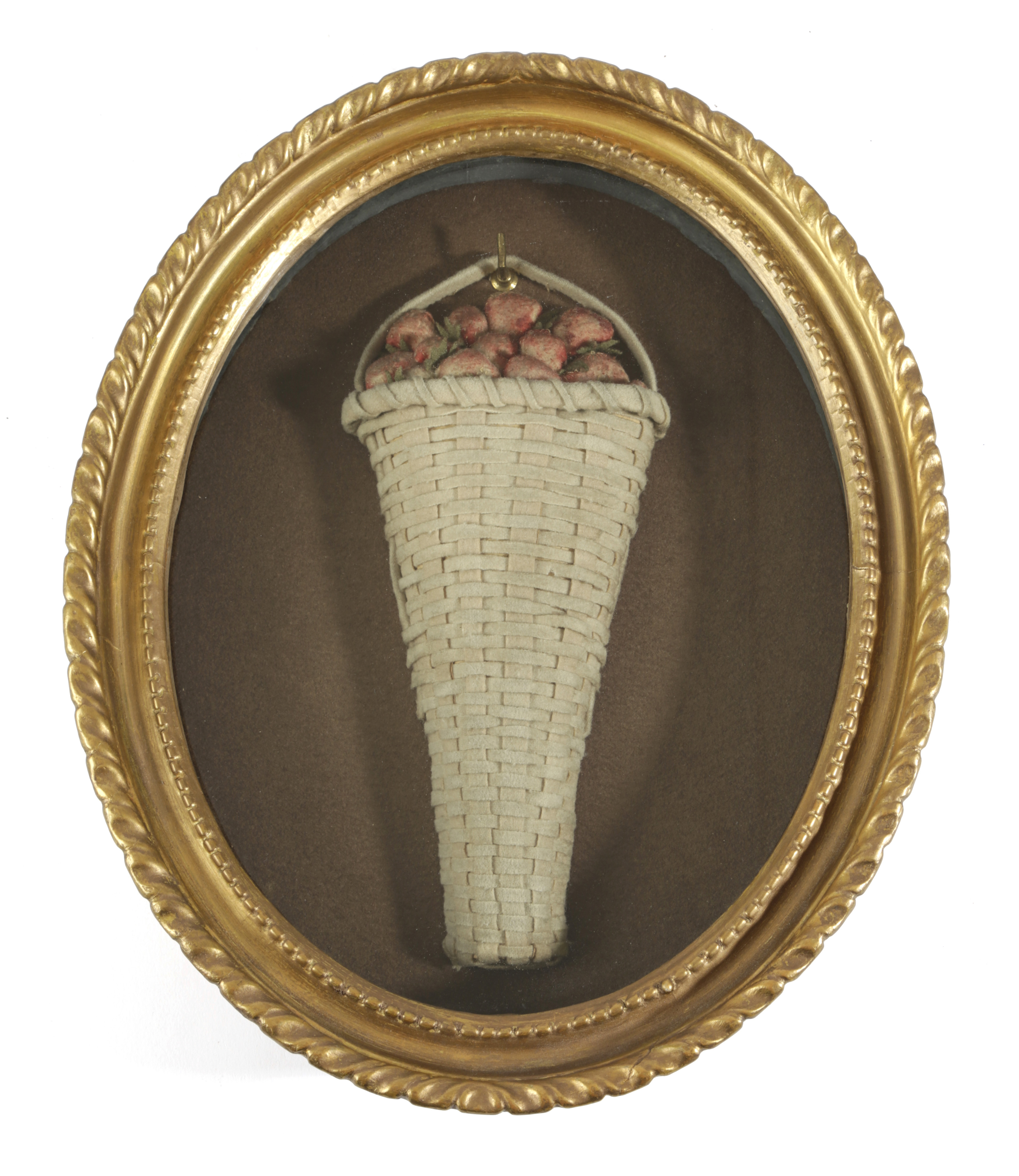 A REGENCY FELTWORK PICTURE EARLY 19TH CENTURY depicting a basket of strawberries, in a glazed oval