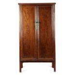 A CHINESE ELM CUPBOARD QING DYNASTY, LATE 18TH / EARLY 19TH CENTURY of panelled construction, with a