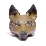 A PAINTED CAST IRON FOX HEAD DOORSTOP 19TH CENTURY 14.3cm high, 16cm deep