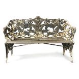 A VICTORIAN CAST IRON FERN AND BLACKBERRY GARDEN BENCH ATTRIBUTED TO COALBROOKDALE, C.1870-75 with a