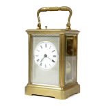 A FRENCH GILT BRASS CARRIAGE CLOCK LATE 19TH CENTURY the brass eight day repeating movement with a
