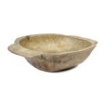 A LARGE SYCAMORE DOUGH BOWL 19TH CENTURY with integral handles and an adzed finish to exterior 15.