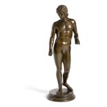 AN ITALIAN BRONZE GRAND TOUR FIGURE OF ADONIS AFTER THE ANTIQUE, 19TH CENTURY on a circular base