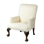 A GEORGE II WALNUT ARMCHAIR C.1730-40 AND LATER later upholstered with damask fabric, with scroll
