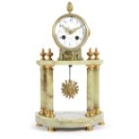 A FRENCH ONYX TEMPLE CLOCK IN LOUIS XVI STYLE LATE 19TH CENTURY the brass eight day drum movement,